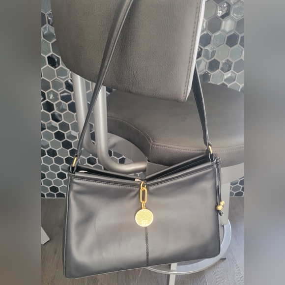 Elegant Black Handbag with Gold Accent - Picture 2 of 11